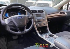 Ford Fusion SE híbrido como nuevo CRÉDITO
