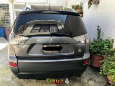 Quiero vender un Mitsubishi Outlander en buena condicción