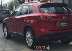 Quiero vender urgentemente mi auto Mazda CX5 2014 muy bien estado