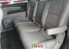 Un Honda Odyssey 2013 impecable te está esperando