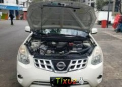 Vendo un carro Nissan Rogue 2012 excelente llámama para verlo