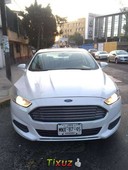 Un Ford Fusion 2013 impecable te está esperando