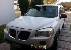 Un Pontiac Montana 2005 impecable te está esperando