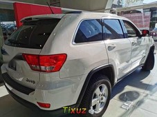 Jeep Grand Cherokee 2012 5p Laredo 4x2 V6 aut L