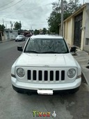 Jeep Patriot con llantas y bateria en GARANTIA
