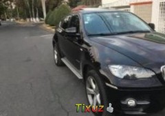 Quiero vender urgentemente mi auto BMW X6 2012 muy bien estado