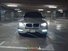Vendo un carro BMW X6 2011 excelente llámama para verlo