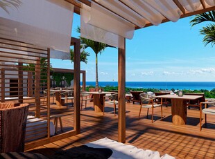 Doomos. Condominio con 2 terrazas, vidta al mar y campo de golf,cuarto de servicio, alacena oculta, venta Corasol, Playa del Carmen.