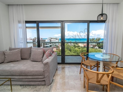 En venta, departamento con vista al mar y terraza envolvente, 2 habitaciones lock-off, con amenidades de hotel, en Zazil Ha, Playa del Carmen, Quintana Roo.
