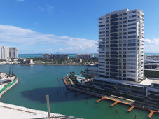 departamento en lujoso desarrollo en venta frente a la marina puerto cancún, quintana roo