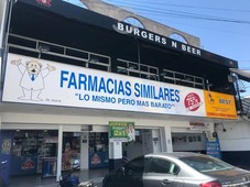 venta de terreno con locales comerciales en