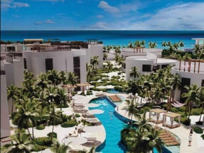 Doomos. Apartamento con club de playa, acceso al mar, areas verdes y amenidades, pre-construccion en venta Chicxulub Yucatan