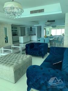 Doomos. Departamento amueblado en venta, Bay View Grand Cancún. HCS6701