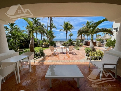 Doomos. Garden villa frente al mar en venta en Puerto Aventuras Riviera Maya ALRZ8114
