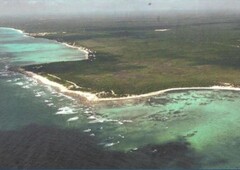 terreno titulado con costa y cenotes en playa del carmen.