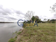 terreno en venta frente al río en juana moza