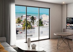 doomos. venta departamento a pasos del mar con amenidades 2 habitaciones incluye ac