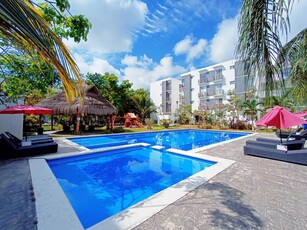 Doomos. Se renta departamento amueblado 2 rec. en Palmas Turquesa Playa del Carmen P4208