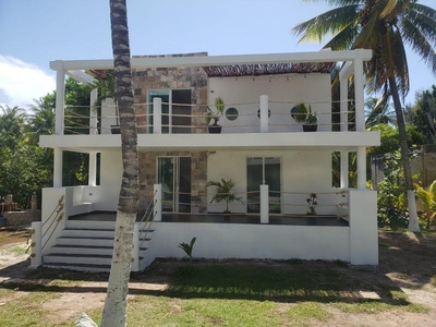 Doomos. Terreno en venta con 2 villas en playas de San Crisanto. Yucatán México.